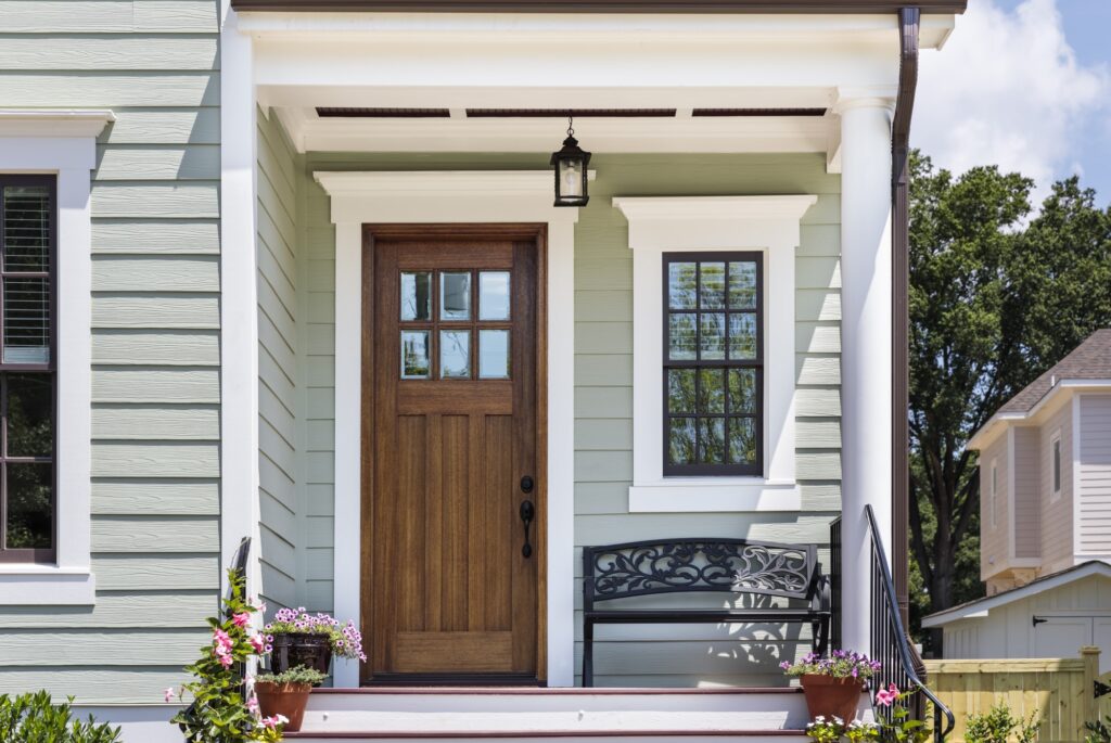 the front of a house after a door replacement